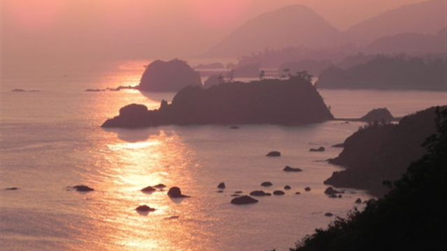 夕焼けの染まる丹後松島の画像